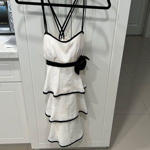 Woman’s A. Byer, size 9, sleeveless dress, white and black with black flower